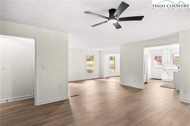 a view of an empty room and window