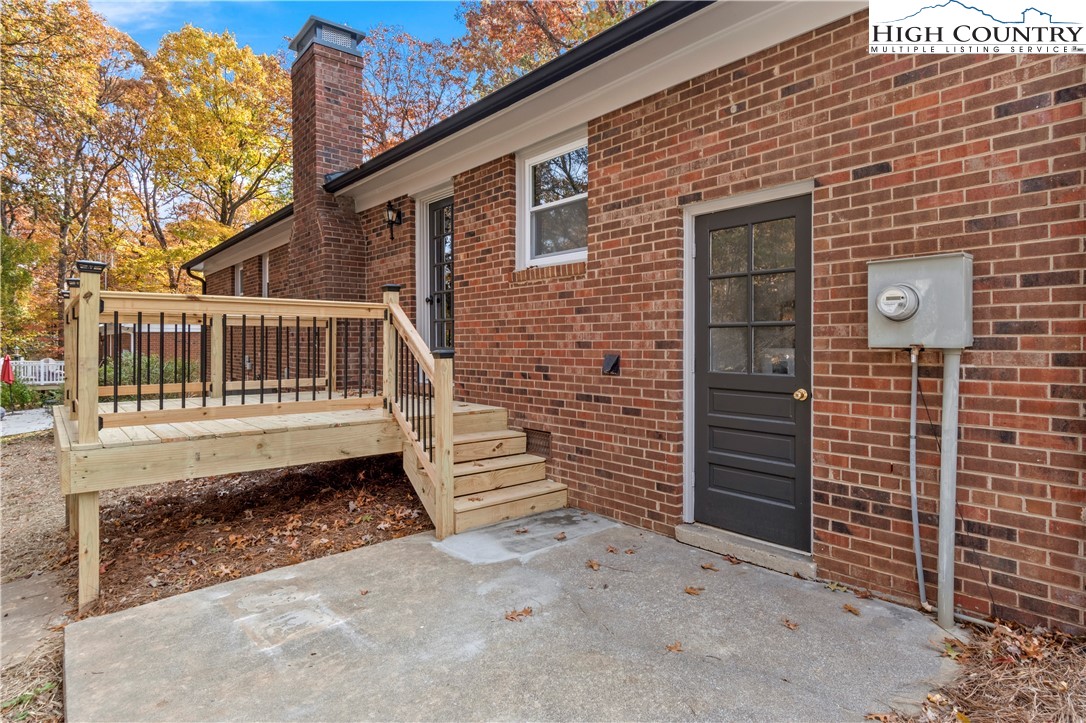 765 Laverton Lane Rural Hall, NC 27045 - Photo 36 of 41 a view of a house with a small yard and wooden fence and large trees