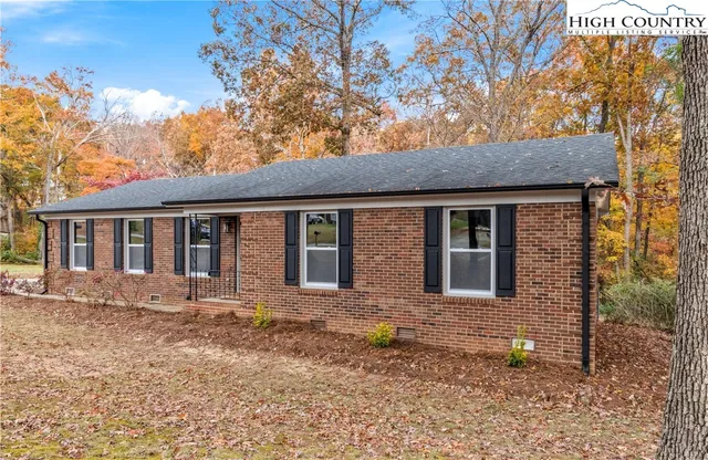 a view of front door of house with window