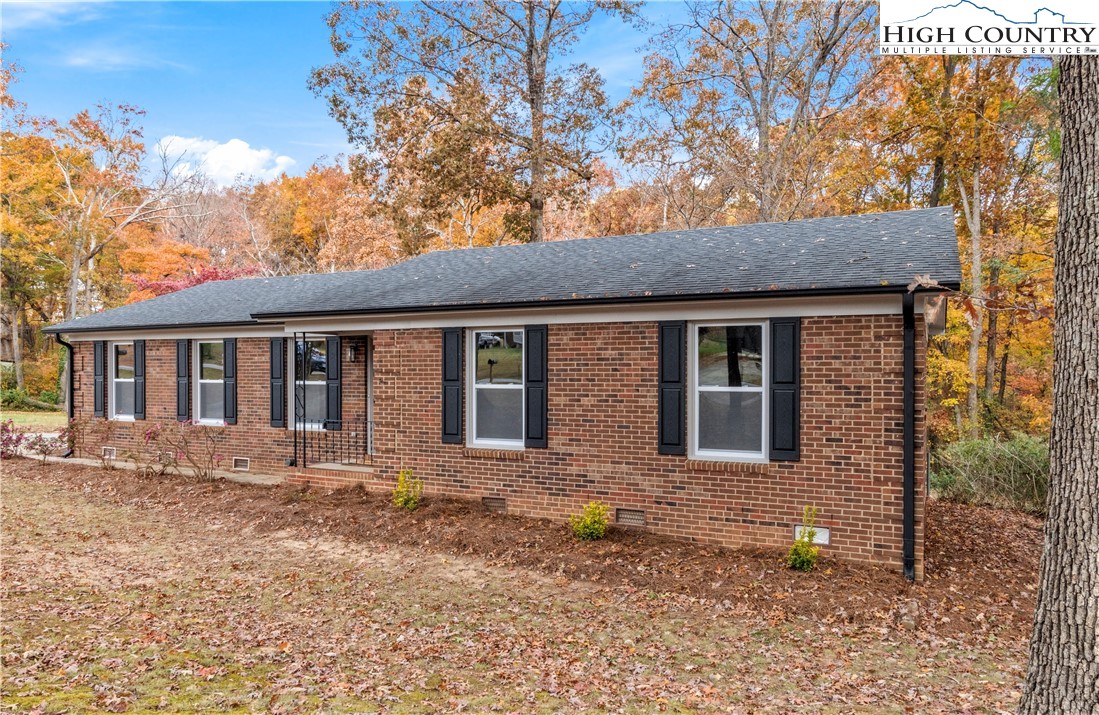 765 Laverton Lane Rural Hall, NC 27045 - Photo 4 of 41 a front view of a house with a yard