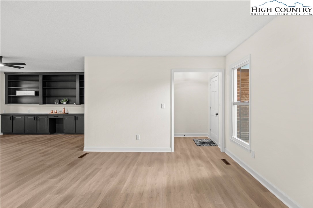 765 Laverton Lane Rural Hall, NC 27045 - Photo 8 of 41 a view of a kitchen with wooden floor and electronic appliances