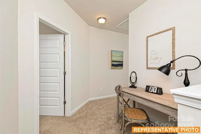 a room with a table and chairs