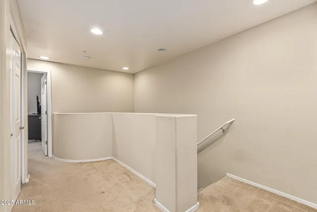 a view of storage and utility room with washer and dryer