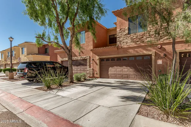 a view of a swimming pool with a lounge chair