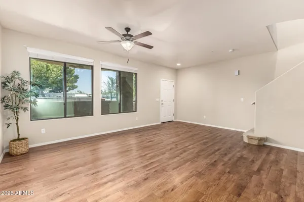 a kitchen with a sink appliances and cabinets