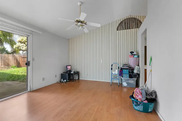 a room with furniture and natural light