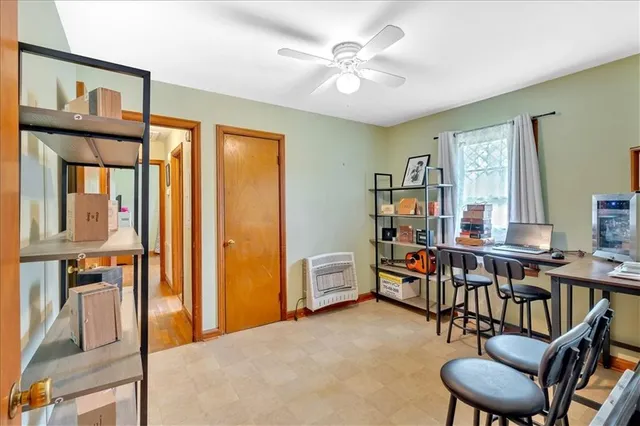 a view of a livingroom with furniture and window