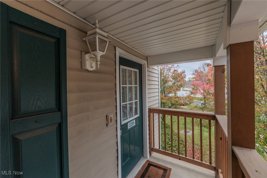 28360 Center Ridge Road, Unit 2210 Westlake, OH 44145 - Photo 3 of 45 Balcony featuring a porch