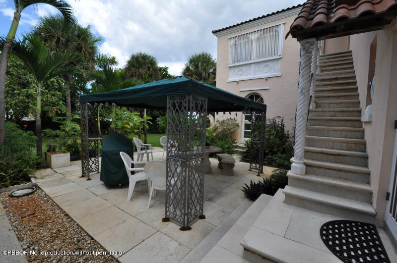 245 Valencia Road West Palm Beach, FL 33401 - Photo 16 of 19 a view of outdoor space yard deck patio and deck