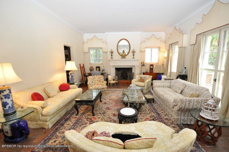 245 Valencia Road West Palm Beach, FL 33401 - Photo 7 of 19 a living room with furniture and a fireplace