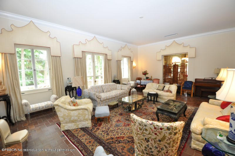245 Valencia Road West Palm Beach, FL 33401 - Photo 9 of 19 a living room with furniture and a large window