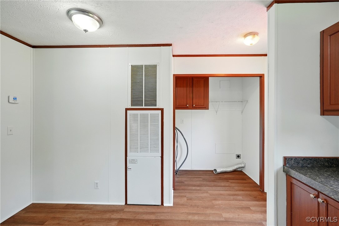 141 Sheppards Drive Farmville, VA 23901 - Photo 11 of 31 a view of a hallway with wooden floor and staircase