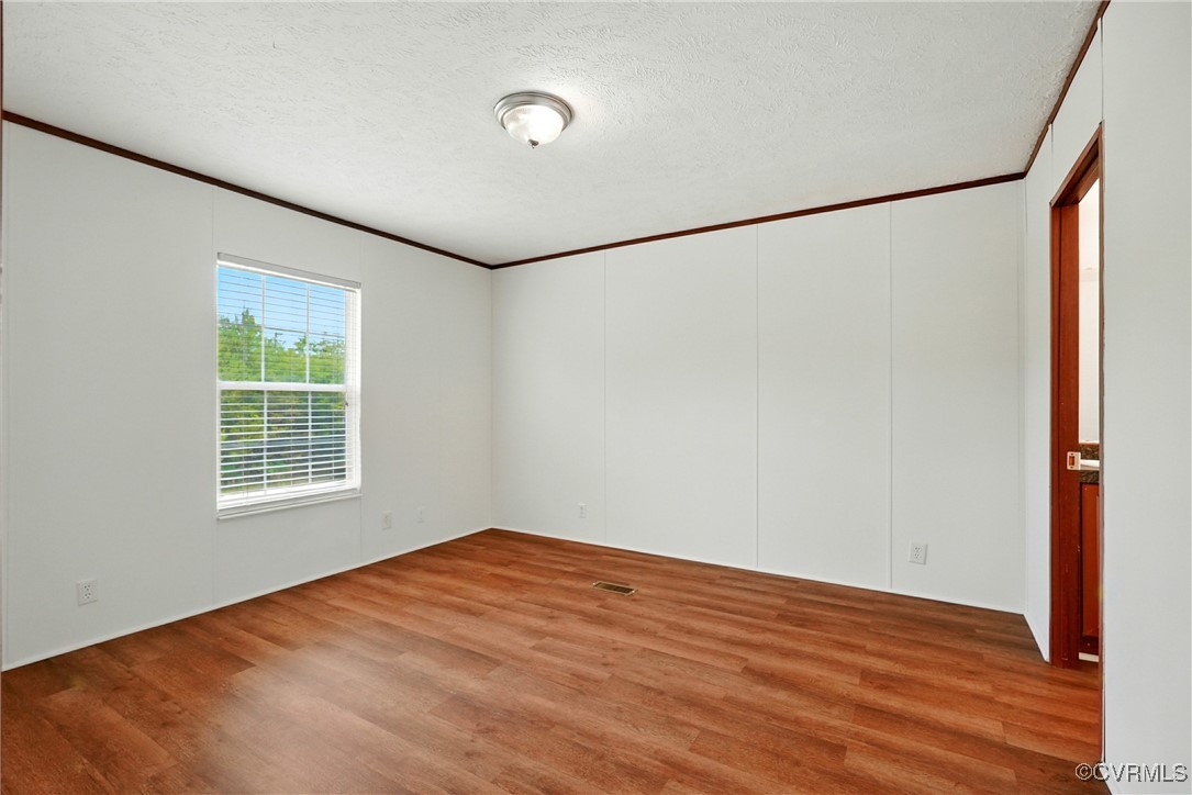 141 Sheppards Drive Farmville, VA 23901 - Photo 12 of 31 a view of a big room with wooden floor and windows