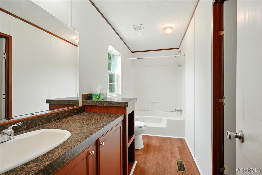 141 Sheppards Drive Farmville, VA 23901 - Photo 14 of 31 a bathroom with a granite countertop sink and a mirror