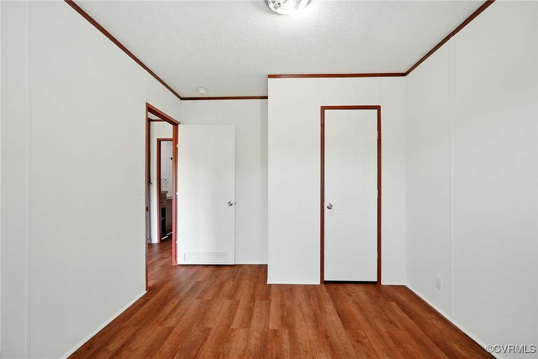 141 Sheppards Drive Farmville, VA 23901 - Photo 21 of 31 a view of an empty room with wooden floor