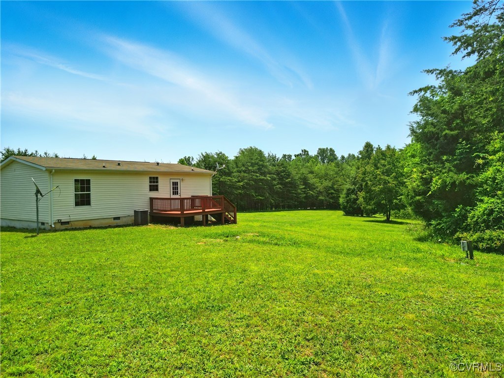 141 Sheppards Drive Farmville, VA 23901 - Photo 27 of 31 a backyard of a house with plants and large tree