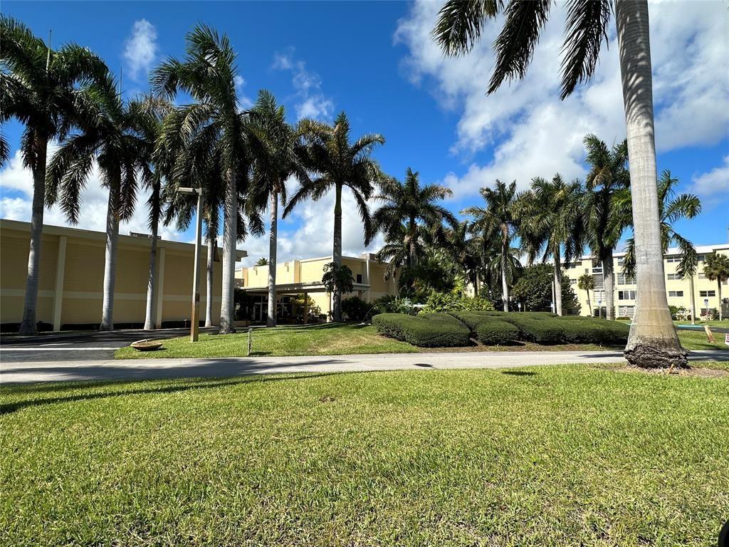 2300 Northeast 1st Lane, Unit 201 Boynton Beach, FL 33435 - Photo 21 of 34 a view of a park with palm trees