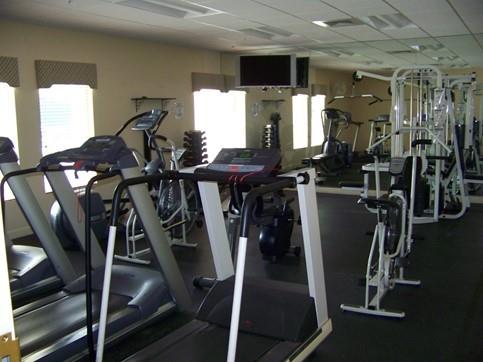 2300 Northeast 1st Lane, Unit 201 Boynton Beach, FL 33435 - Photo 30 of 34 a view of a room with gym equipment