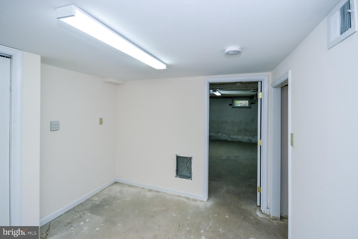 12311 Judson Road Silver Spring, MD 20906 - Photo 25 of 29 an empty room with an entryway door