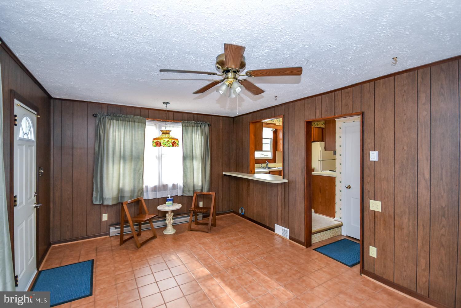 12311 Judson Road Silver Spring, MD 20906 - Photo 9 of 29 a living room with furniture and a window
