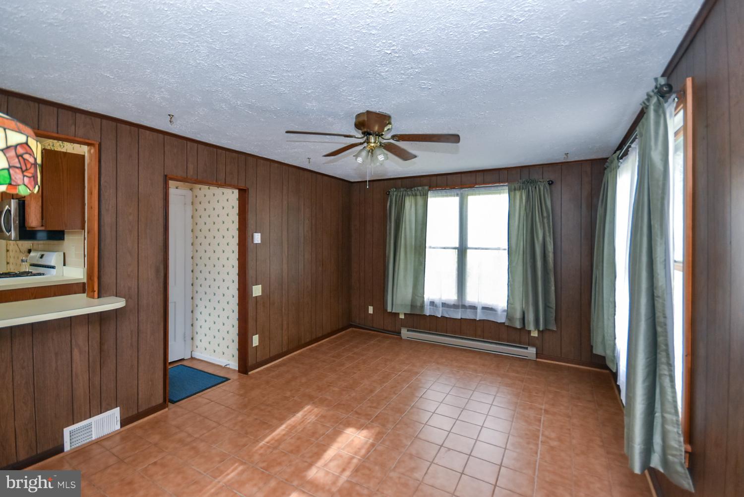 12311 Judson Road Silver Spring, MD 20906 - Photo 10 of 29 a view of an empty room with a window
