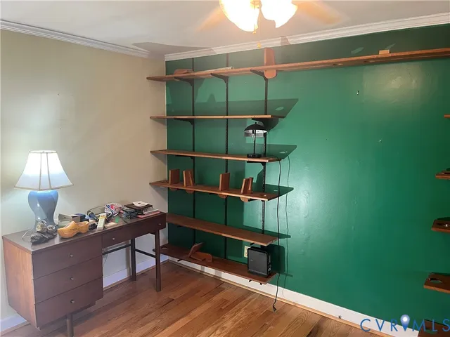 a room with window and wooden floor