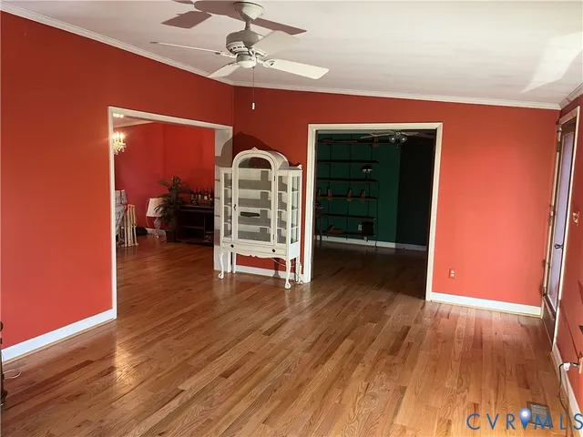 a view of livingroom with furniture and workspace