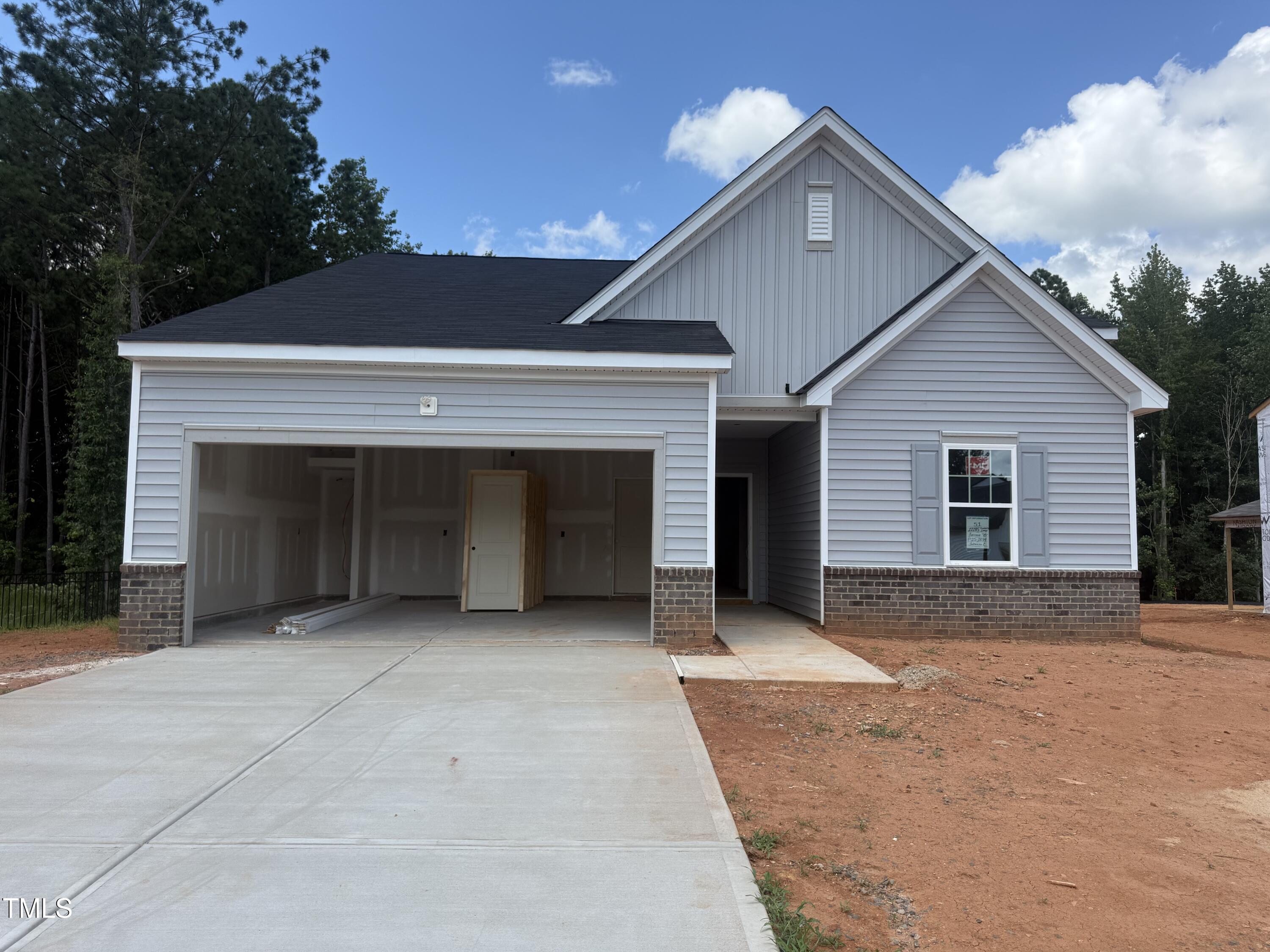 11185 Salers Loop Middlesex, NC 27557 - Photo 25 of 41 a front view of a house with a garage