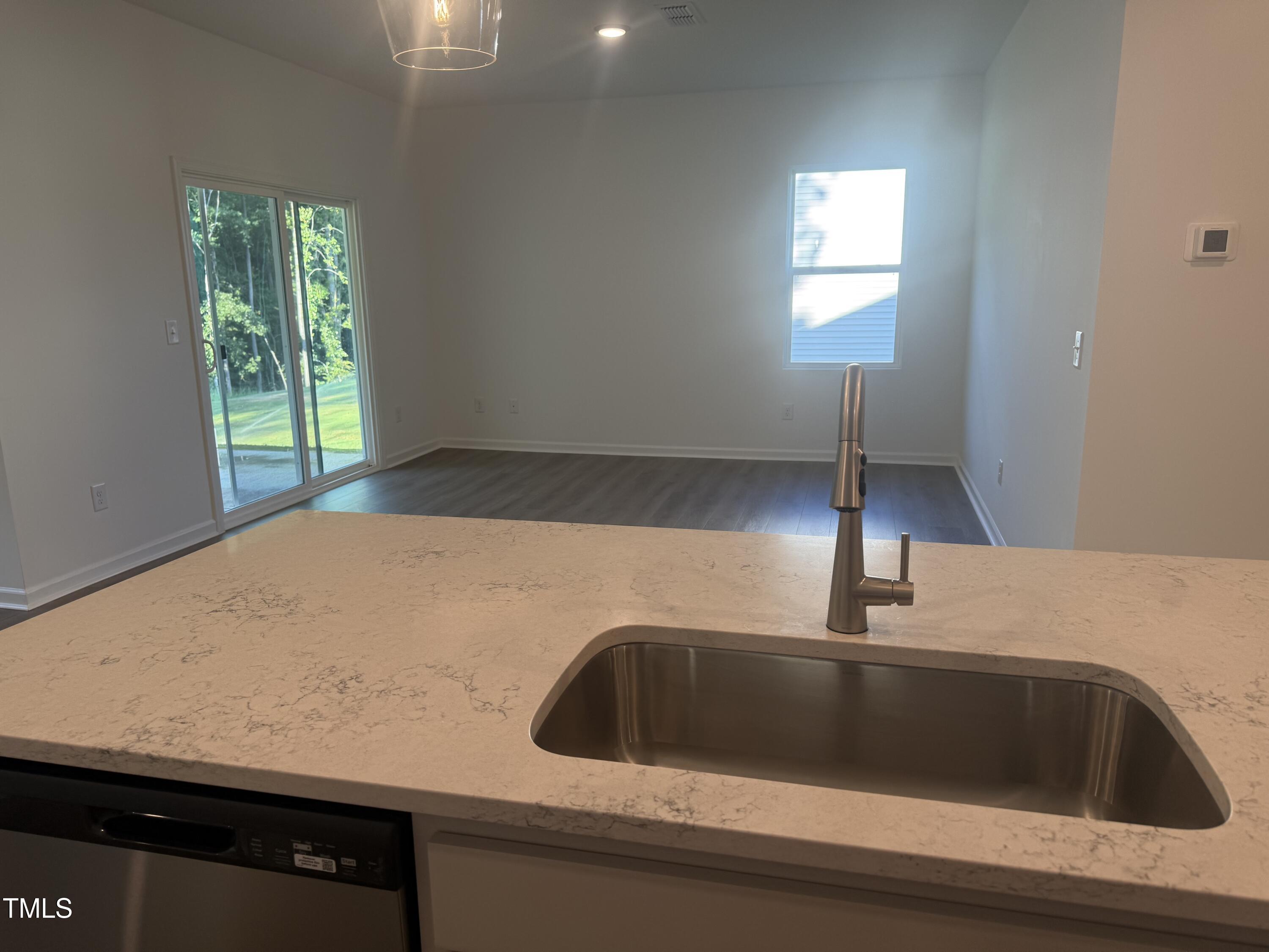 11185 Salers Loop Middlesex, NC 27557 - Photo 37 of 41 a kitchen with a sink and a window