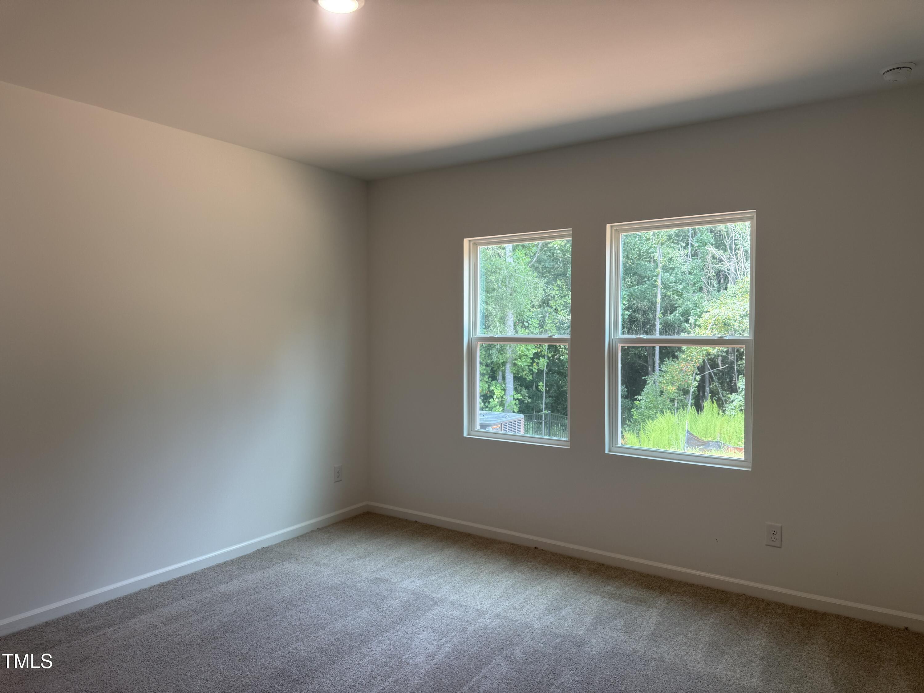 11185 Salers Loop Middlesex, NC 27557 - Photo 10 of 41 an empty room with a window
