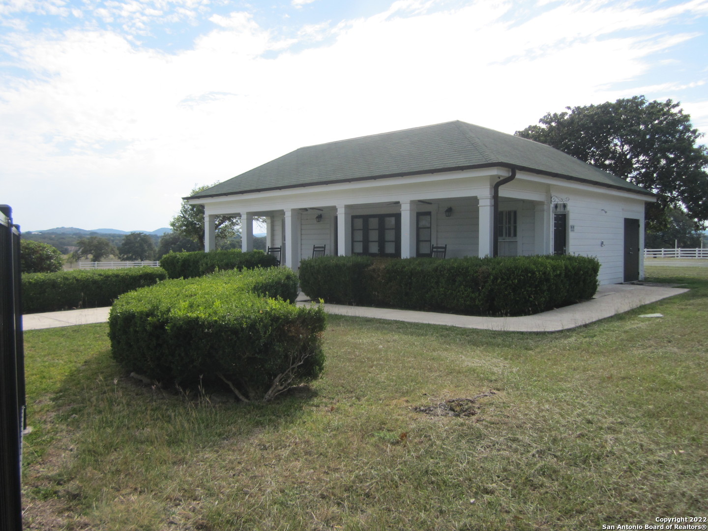 Tbd Little Sorrel Way Bandera, TX 78003 - Photo 11 of 12 a view of a house with a garden