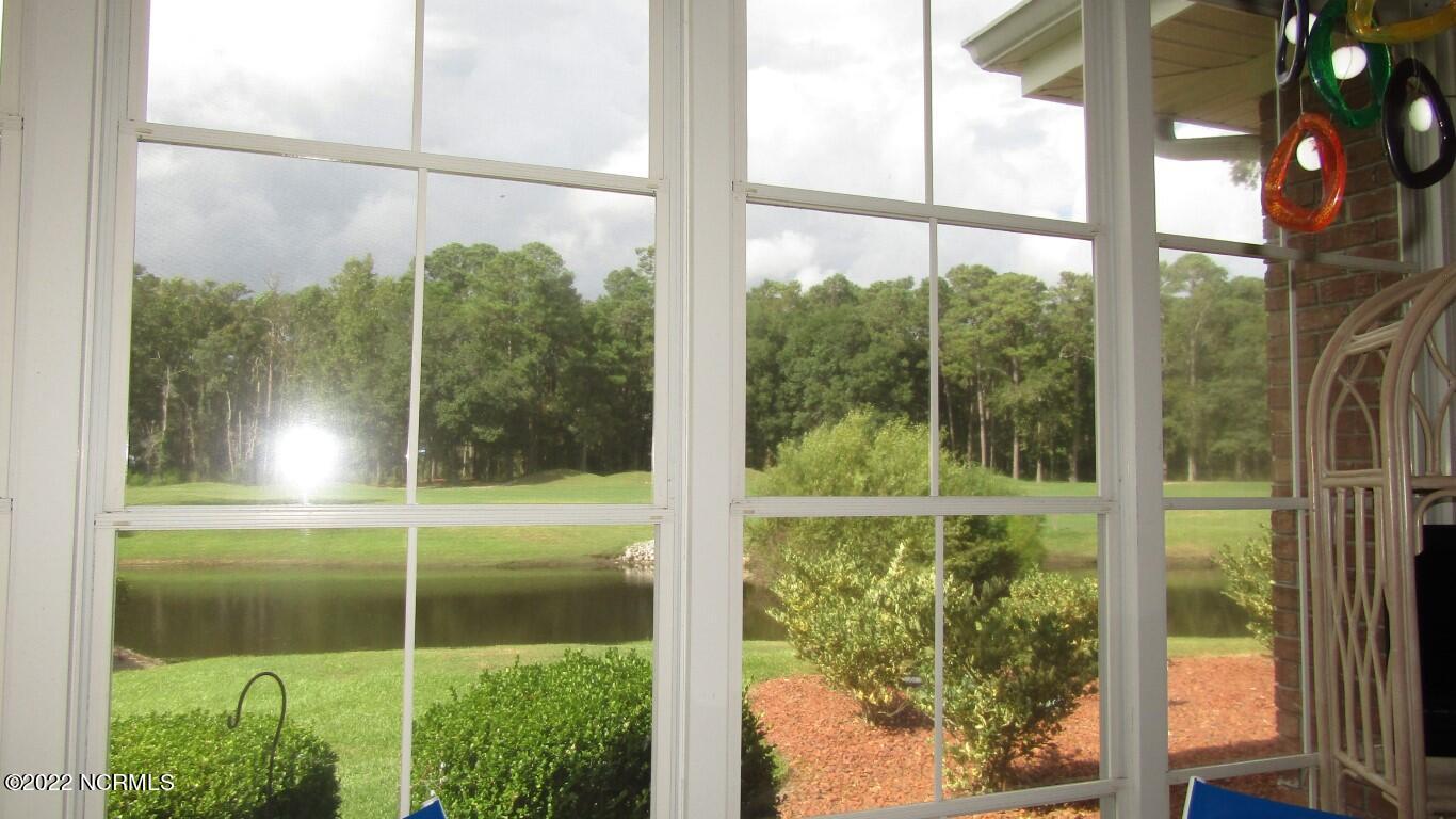 144 Rice Mill Circle, Unit 1 Sunset Beach, NC 28468 - Photo 19 of 36 Vinyl Window Enclosure