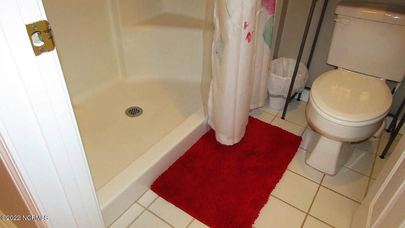144 Rice Mill Circle, Unit 1 Sunset Beach, NC 28468 - Photo 24 of 36 Step-In Shower