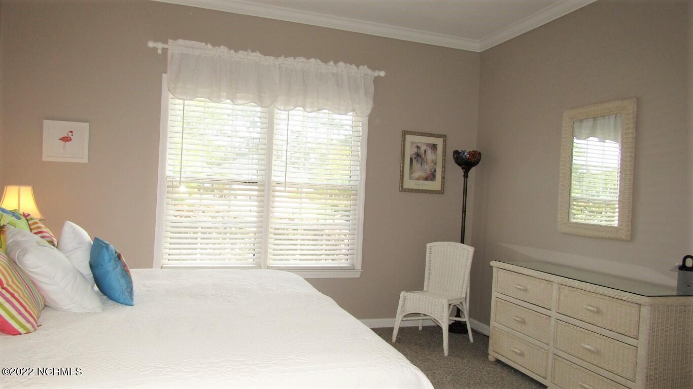 144 Rice Mill Circle, Unit 1 Sunset Beach, NC 28468 - Photo 27 of 36 Guest Bedroom