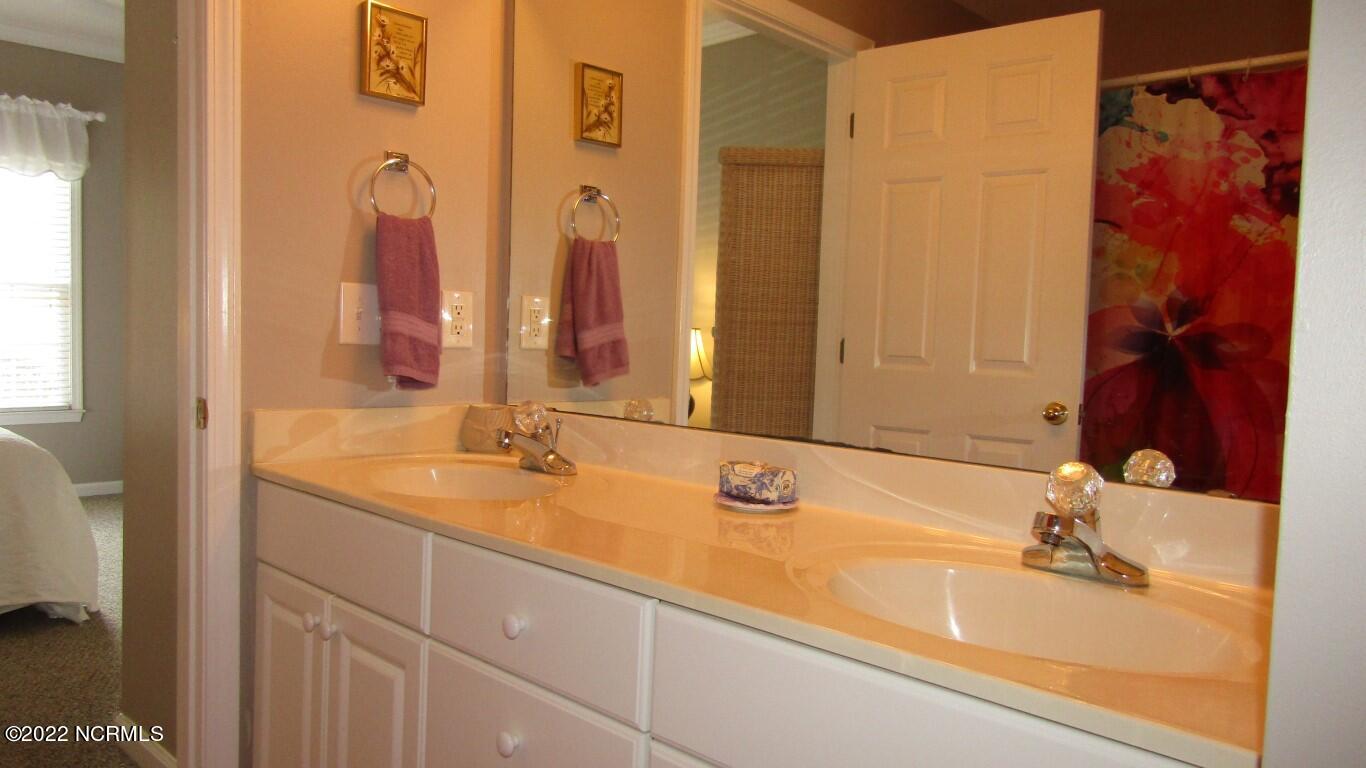 144 Rice Mill Circle, Unit 1 Sunset Beach, NC 28468 - Photo 29 of 36 Double Vanity in Guest Bath