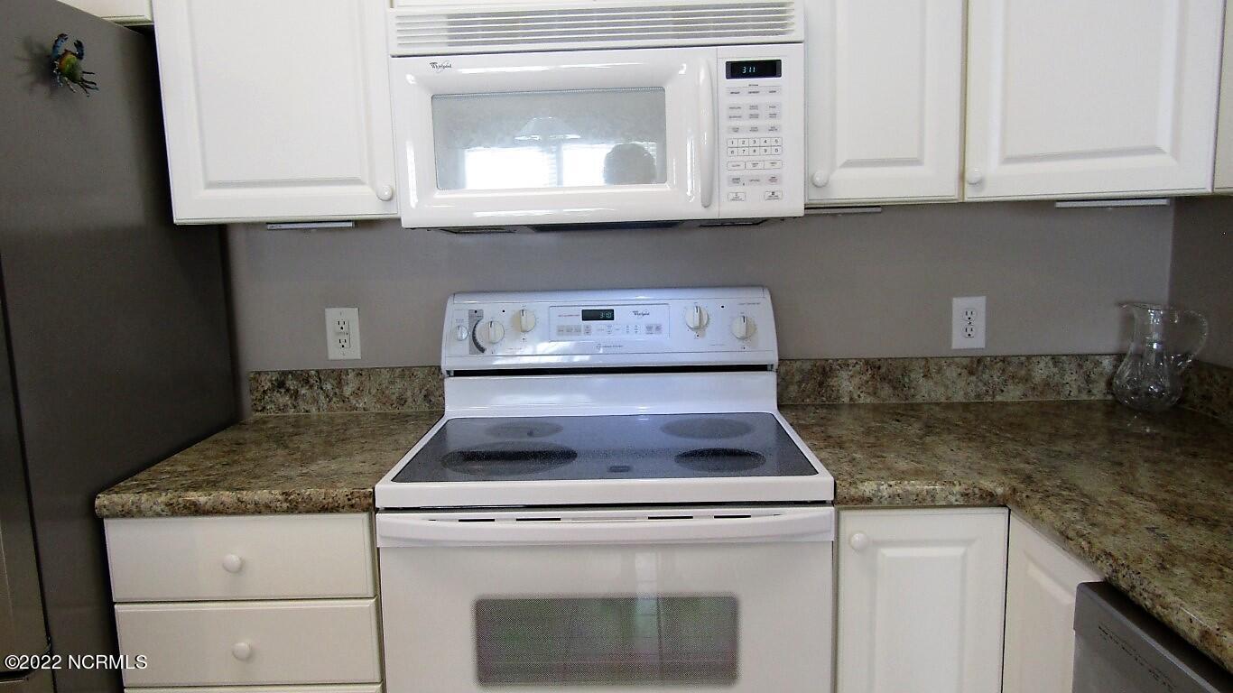 144 Rice Mill Circle, Unit 1 Sunset Beach, NC 28468 - Photo 6 of 36 Range & Microwave