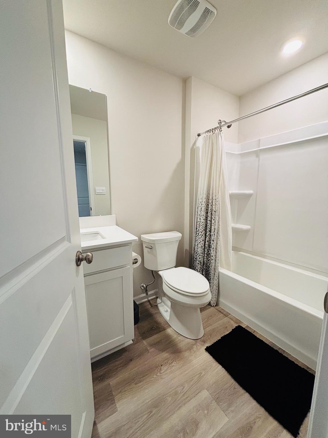1178 Martin Road Breinigsville, PA 18031 - Photo 17 of 29 a white toilet sitting next to a bathroom sink and a shower