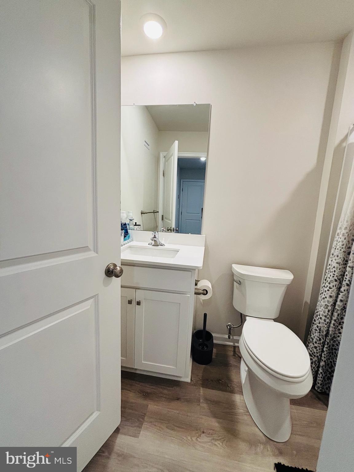 1178 Martin Road Breinigsville, PA 18031 - Photo 18 of 29 a bathroom with a toilet sink and mirror