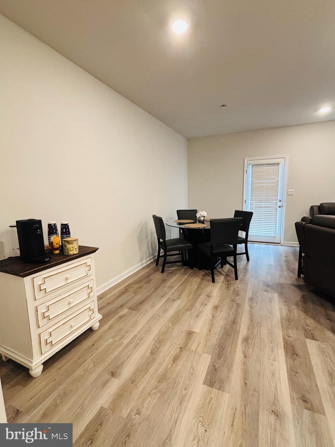 1178 Martin Road Breinigsville, PA 18031 - Photo 4 of 29 a view of a workspace with furniture and a wooden floor