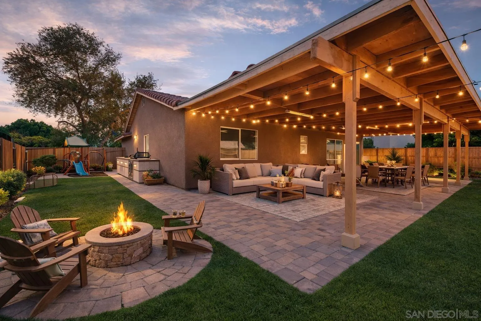 931 Jones Street Brawley, CA 92227 - Photo 12 of 17 a view of a backyard with table and chairs potted plants and a palm tree