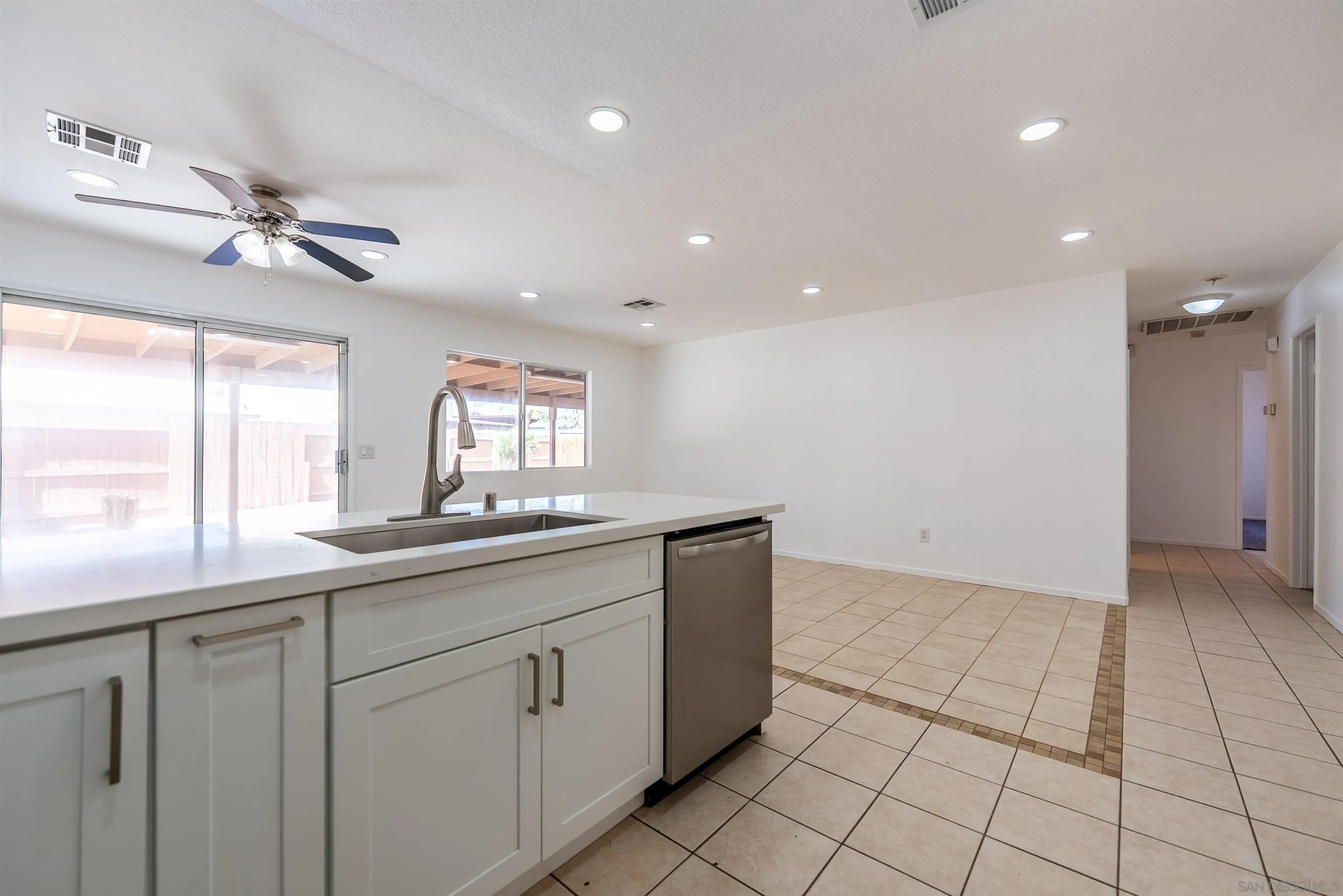 931 Jones Street Brawley, CA 92227 - Photo 9 of 17 a kitchen with granite countertop a sink and a stove