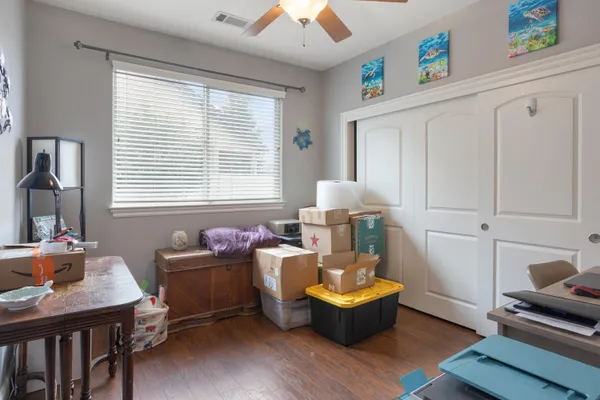 a living room with furniture and a window