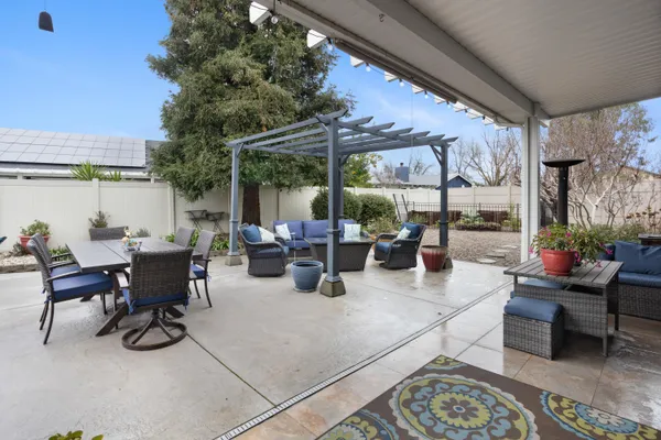 a view of a terrace with furniture