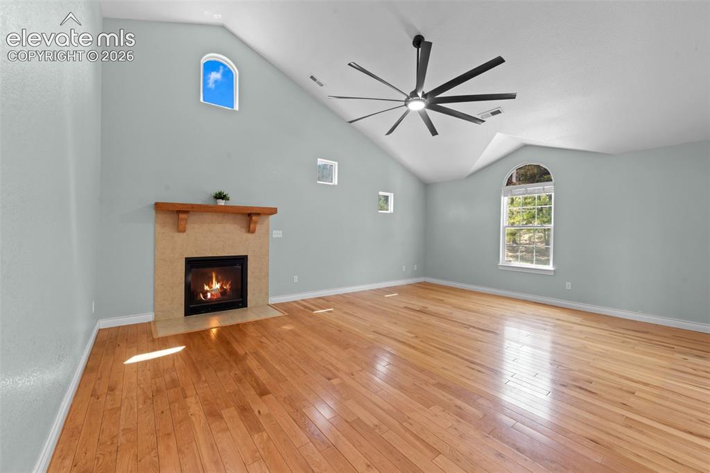 16540 Mesquite Road Peyton, CO 80831 - Photo 26 of 50 a view of empty room with wooden floor and fan