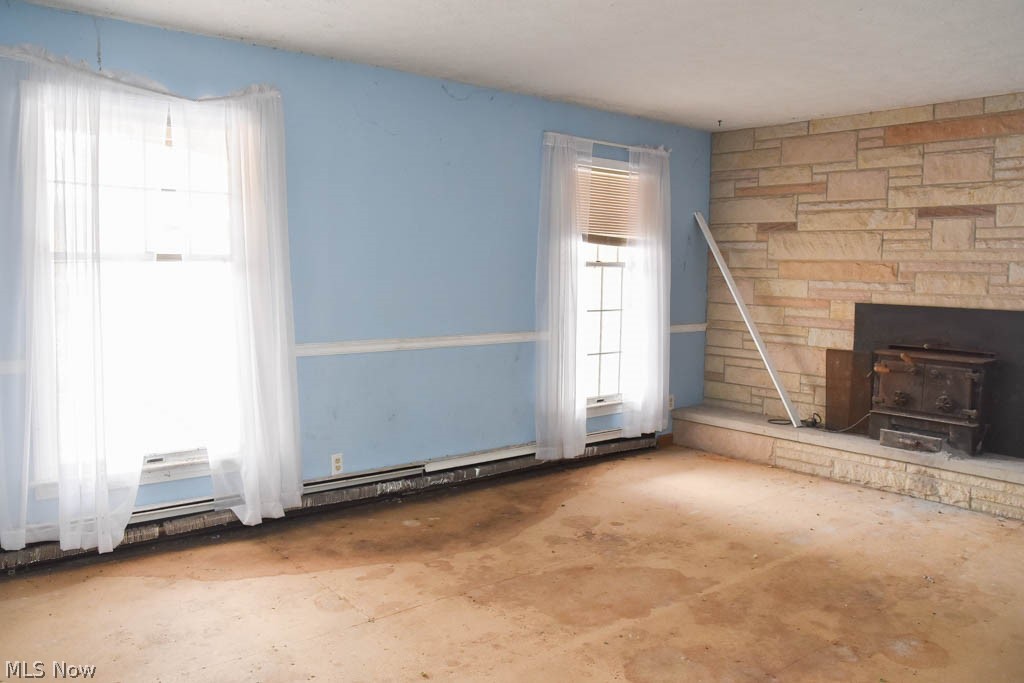 5201 Rootstown Road Ravenna, OH 44266 - Photo 7 of 18 Fireplace in the living room.