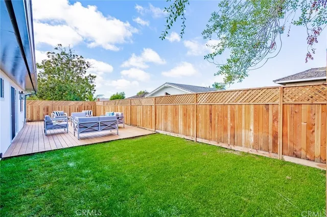 a view of yard with seating area