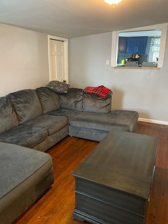 368 Globe Street Fall River, MA 02724 - Photo 12 of 31 a living room with furniture and wooden floor