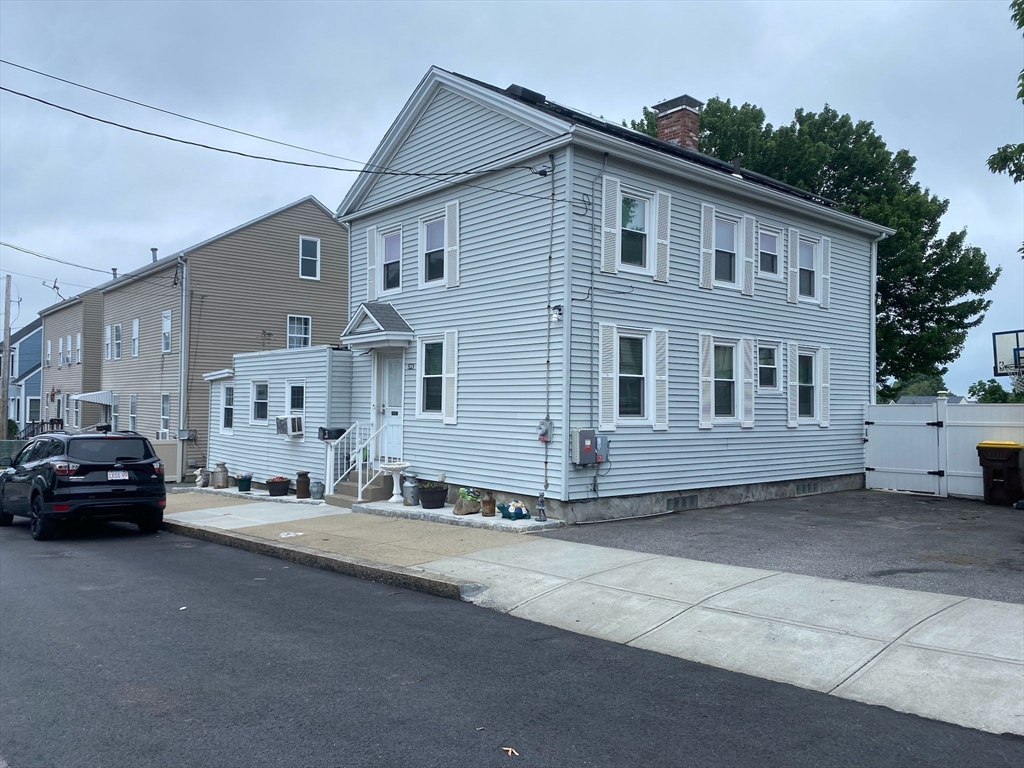 368 Globe Street Fall River, MA 02724 - Photo 5 of 31 a view of a car park in front of house