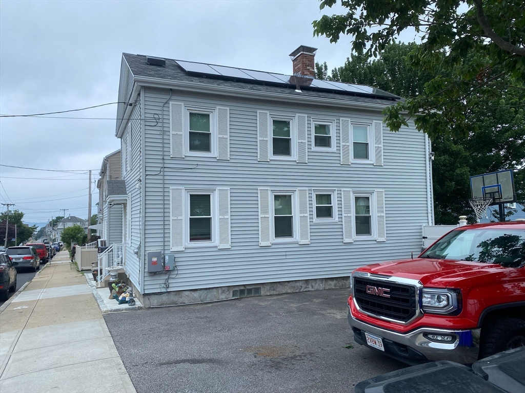368 Globe Street Fall River, MA 02724 - Photo 7 of 31 a front view of a house with parking space