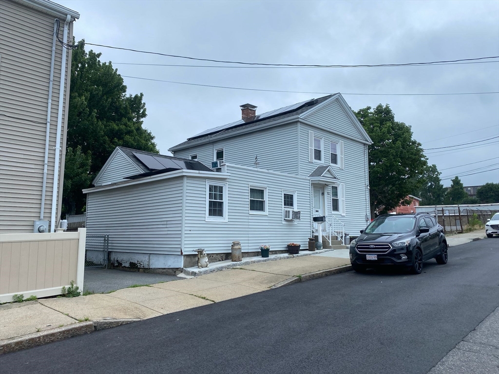 368 Globe Street Fall River, MA 02724 - Photo 8 of 31 a car parked in front of house